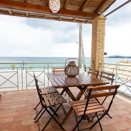 Seaview Stone Apartment In Ipsos Beach Exterior photo