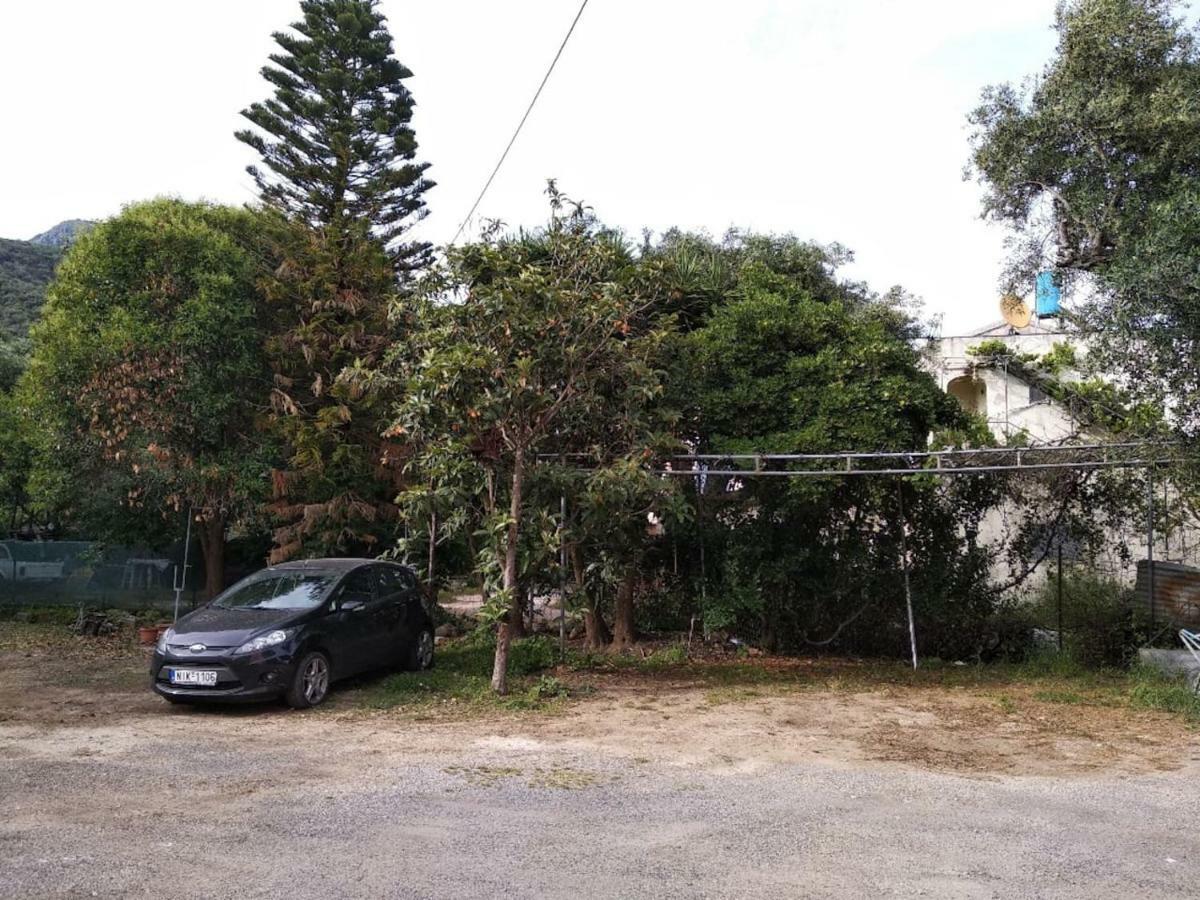 Seaview Stone Apartment In Ipsos Beach Exterior photo